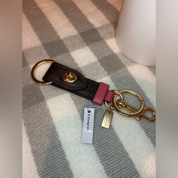 Coach Other Coach Trigger Snap Bag Charm In Signature Canvas Brown